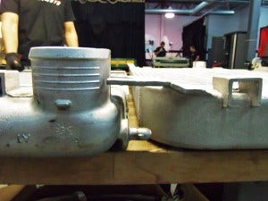 Thickness comparison of Mishimoto prototype intercooler (right) and factory intercooler (left) 