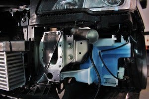 Intercooler crash beam mounting plates