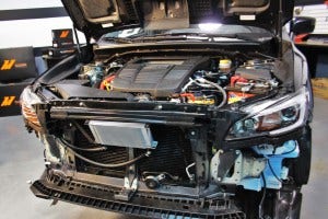 Intercooler crash beam mounting plates
