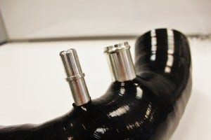 Mishimoto silicone inlet hose with CNC-machined fittings