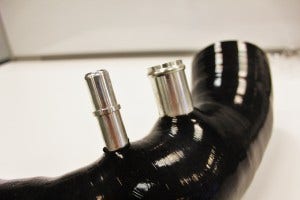 Mishimoto silicone inlet hose with CNC-machined fittings 