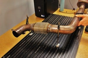 Stock downpipe on CMM table