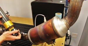 Stock downpipe on CMM table