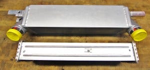 Mishimoto intercooler (top) and stock intercooler core (bottom)