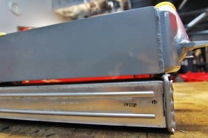 Mishimoto intercooler (top) and stock intercooler core (bottom)