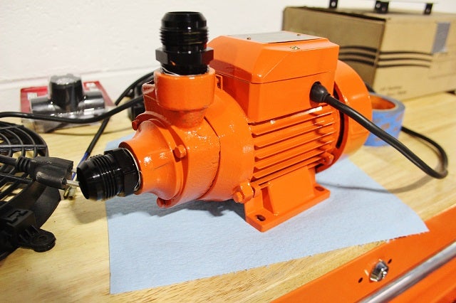 Water pump in Mishimoto orange