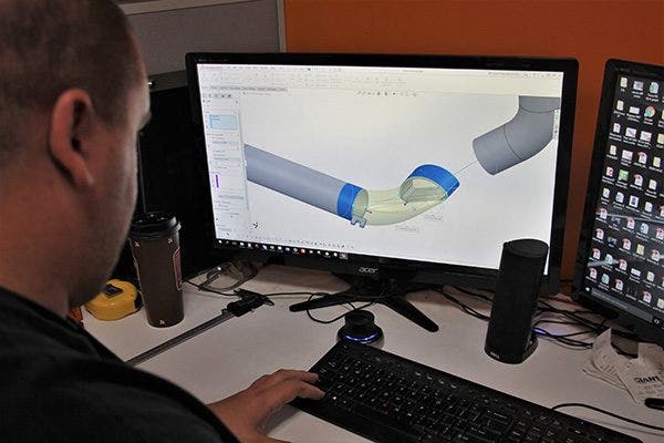 Dan redesigning the intercooler pipe via CAD software