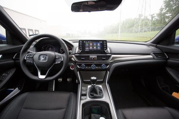 In this day and age, it's not very common to still see three pedals in the driver's side footwell. Honda is keeping the sport side of the Sport trim alive with some good old-fashioned gear shifting.