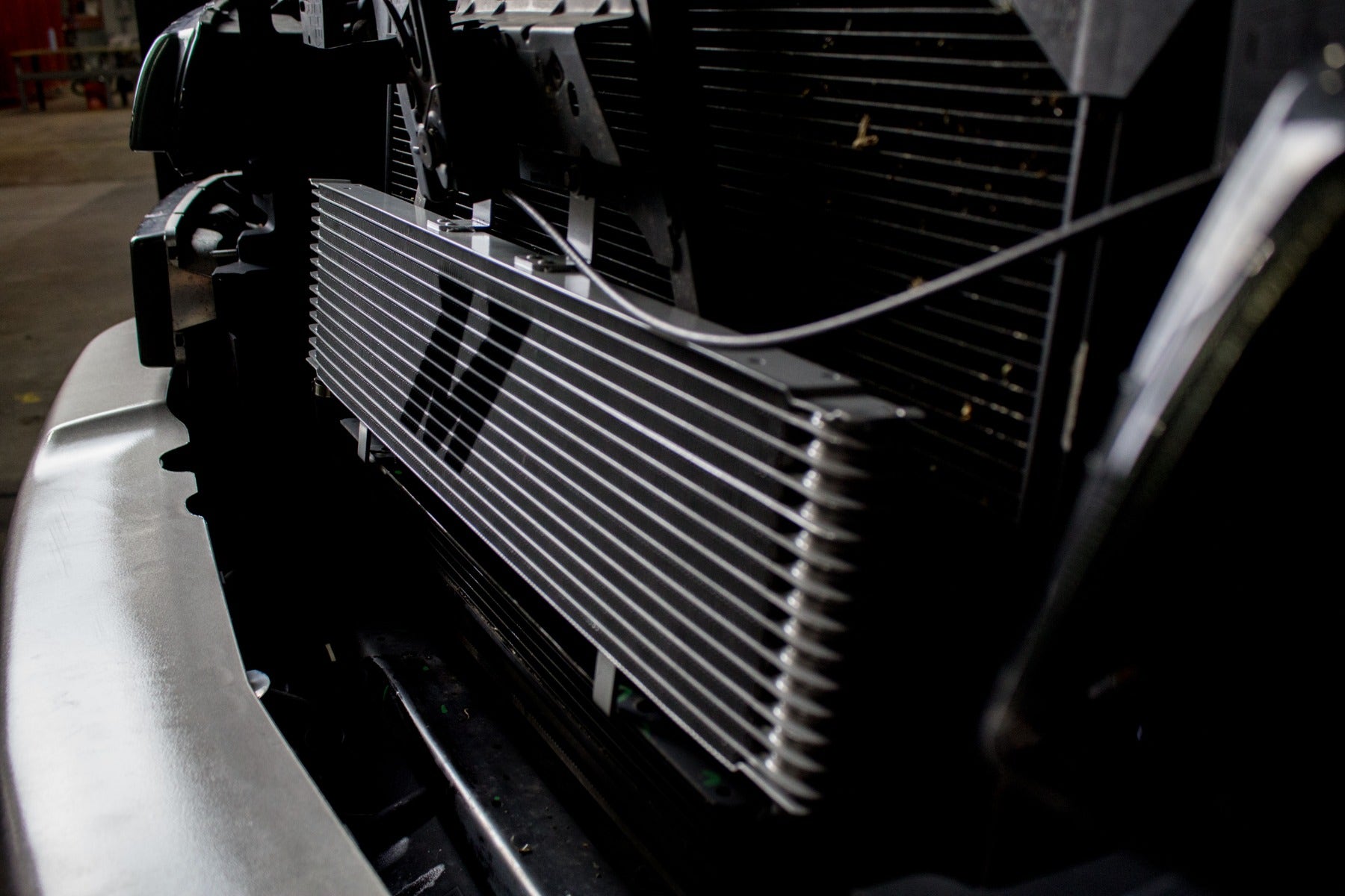 Mishimoto transmission cooler installed on a truck.