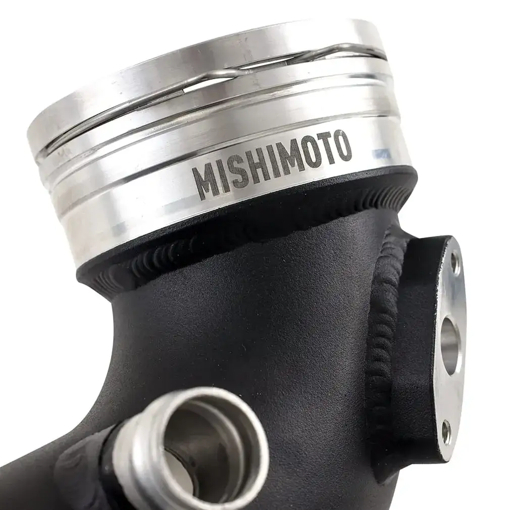 A close-up image of the quick-disconnect fitting on the Mishimoto charge pipe for the BMW N54 engine.