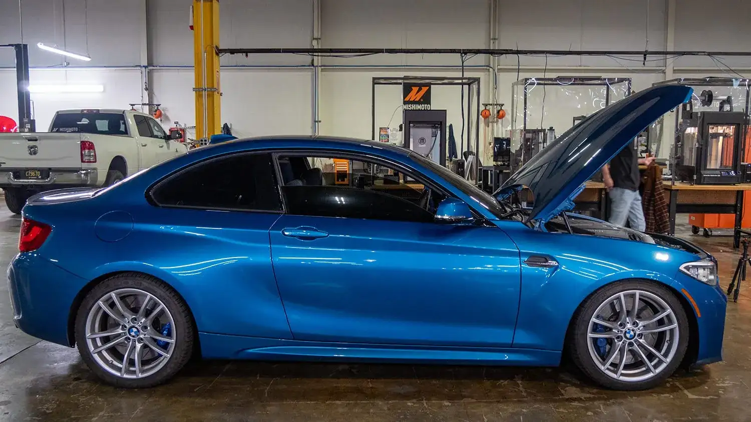 An image of a blue 2017 BMW M2.